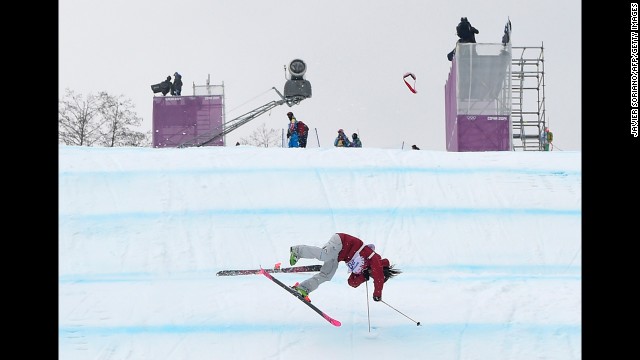 Canadian skier Yuki Tsubota crashes in the slopestyle finals on February 11.