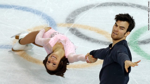 Canada's Meagan Duhamel and Eric Radford perform their short program in the pairs figure skating event.