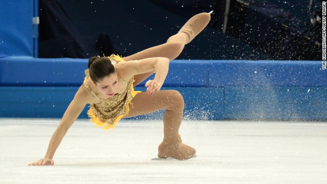 Italy's Stefania Berton falls as she performs in pairs figure skating on February 11.
