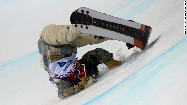Danny Davis of the United States falls during his first run in the halfpipe finals on February 11.