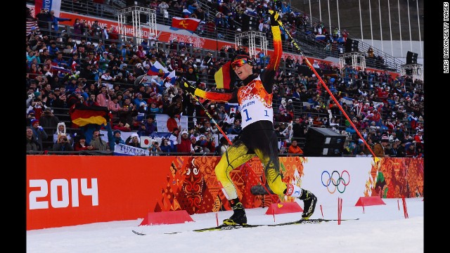 Eric Frenzel of Germany celebrates after winning the gold medal in the men's Nordic combined normal hill event on February 12.