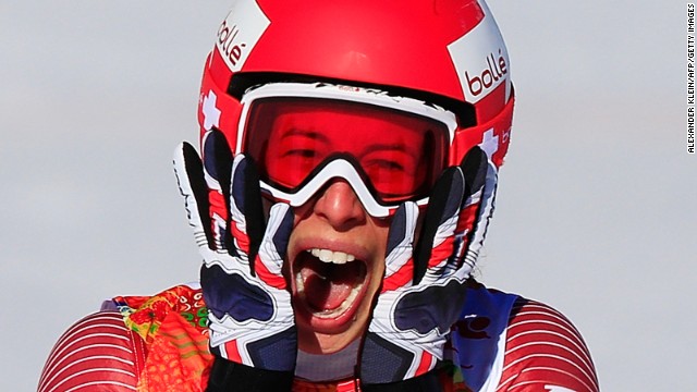Swiss skier Dominique Gisin reacts after finishing her run in the downhill event February 12.