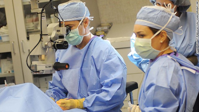 Rand Paul operates at the Pain Management Center near Paducah, Kentucky, in February 2012. Paul had to close his office in Bowling Green after his election to the Senate and sessions like this allow him to keep current with his practice. Senate ethics laws prevent him from accepting payment for any job other than his duties in Washington. 