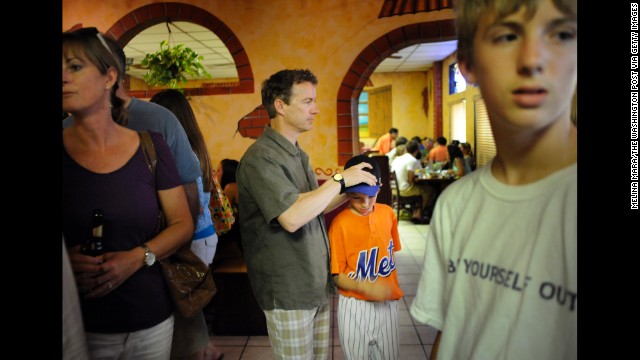 Rand Paul waits for a table at a Mexican restaurant with his sons, Robert, 11, and Duncan, 14, in May 2010 in Bowling Green, Kentucky. 