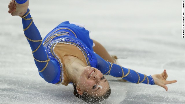 Israel's Evgeni Krasnopolski and Andrea Davidovich compete in pairs figure skating on February 12.