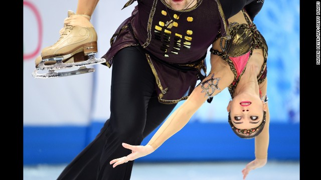 Russia's Vera Bazarova lets partner Yuri Larionov do the lifting during pairs figure skating on February 12.