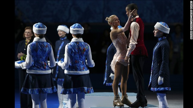 Germany's Aliona Savchenko and Robin Szolkowy receive the bronze medal for pairs figure skating on February 12.
