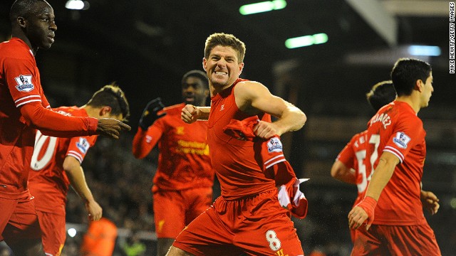 Steven Gerrard (center) celebrates in front of Liverpool's traveling fans after scoring the winner against Fulham on Wednesday. 