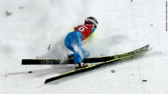 Kamil Stoch of Poland crashes during a training session for the large hill ski jumping event on February 12.