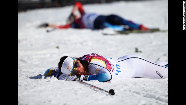 Charlotte Kalla of Sweden reacts after crossing the finish line in the women's 10-kilometer classic.
