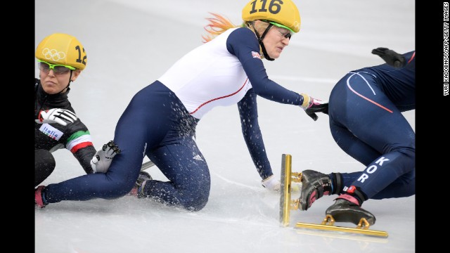 From left, Italy's Arianna Fontana, Great Britain's Elise Christie and South Korea's Park Seung-Hi fall as they compete in the 500-meter short track speedskating final on February 13.