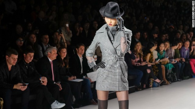 Malaysian-born designer Zang Toi showed his fall collection on February 12. He opened up the show with a series of tailored, gray plaid pieces.