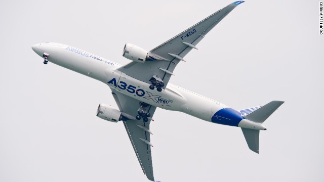 Airbus put one of its A350 test planes on display at the Singapore Airshow this week, giving journalists and officials a look inside the new fuel-efficient, extra wide bodied passenger jet. For now, only crew and mechanics are allowed aboard while the plane is in flight. 