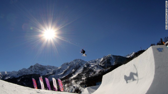 The sun, the snow, the tricks: Oystein Braaten of Norway flies high in the slopestyle competition.