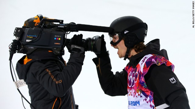 Podladtchikov, born in Russia but competing for Switzerland, shares his happiness up close with a TV camera.