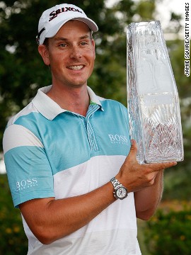 Stenson shows off the TPC winner's trophy. The win took him to a then career high ranking of world no. 5. 