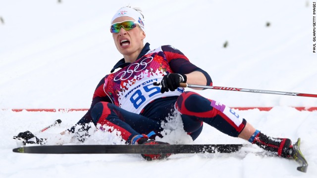 Saevar Birgisson of Iceland collapses after competing in the men's 15-kilometer classic.