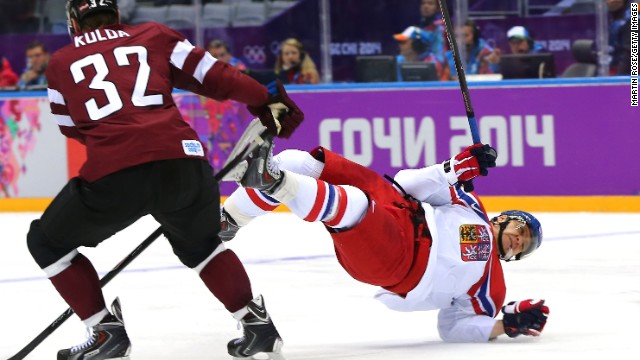Hockey player Martin Erat of the Czech Republic falls to the ice February 14.