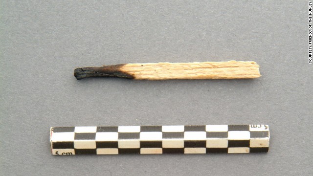This burnt matchstick was found buried in the sediment-filled interior of the H.L. Hunley. 