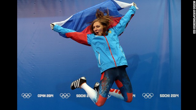 Elena Nikitina of Russia celebrates her bronze medal after the skeleton final on February 14. 