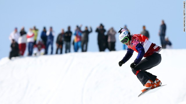 Eva Samkova of the Czech Republic finishes the second-to-last jump February 16 in the final of the women's snowboard cross. 