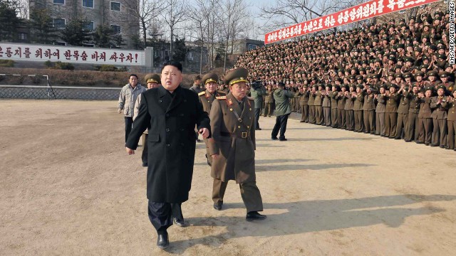 Kim inspects the command of an army unit in this undated photo released Sunday, January 12, by the KCNA.