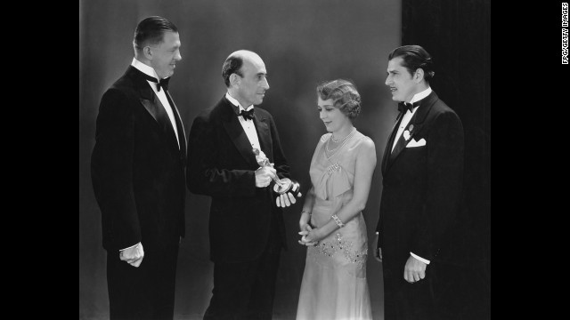 In 1930, there were actually two Oscar ceremonies. Actress Mary Pickford, seen here, receives her best actress Oscar in April 1930 for her performance in the 1929 film "Coquette."