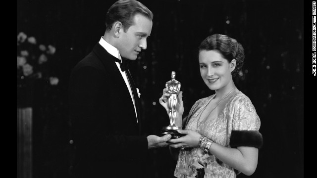 Norma Shearer receives a best actress Oscar in October 1930 for her role in "The Divorcee." Giving her the award is Conrad Nagel, who starred with her in the film released earlier that year.