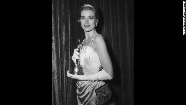 Grace Kelly poses with her Oscar after the Academy Awards ceremony in 1955. She won the statuette for her role in "The Country Girl."