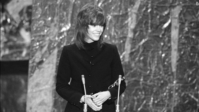 Jane Fonda cradles the best actress Oscar she received for "Klute."