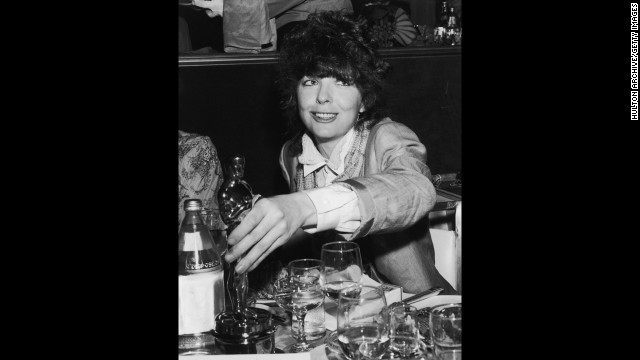 Diane Keaton places her Oscar on a restaurant table after the Academy Awards ceremony in 1978. She received the award for her role in "Annie Hall."