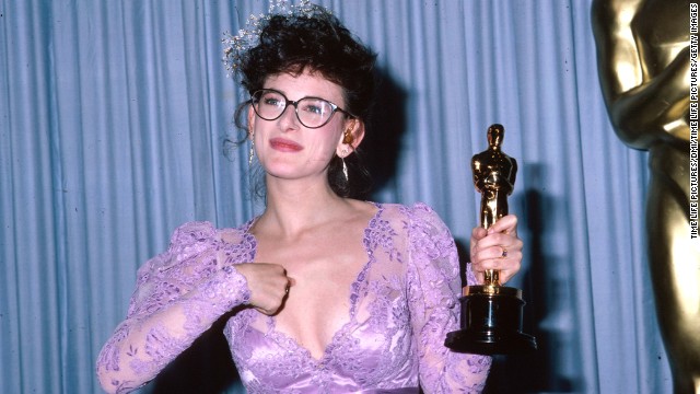 Hearing-impaired actress Marlee Matlin uses sign language while holding the Academy Award she won for "Children of a Lesser God."