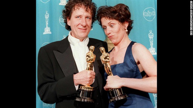 Frances McDormand, who won best actress for her role in "Fargo," poses with Geoffrey Rush, who won best actor that year. 