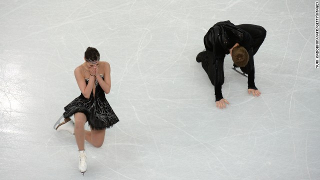 Russia's Nikita Katsalapov and Elena Ilinykh react after their ice dancing performing on February 17.