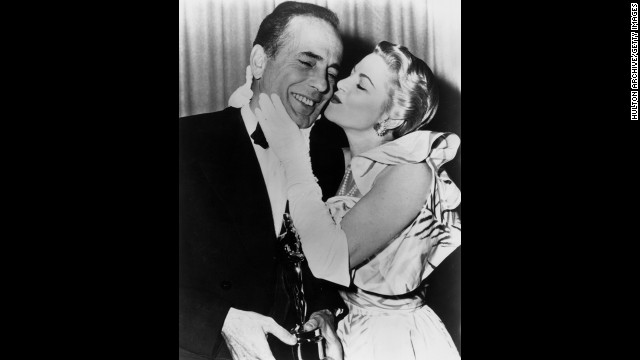 Claire Trevor can't resist giving Humphrey Bogart a kiss backstage at the 1952 Oscars ceremony after he won the best actor award for "The African Queen." Bogart beat out Marlon Brando in "A Streetcar Named Desire," Fredric March in "Death of a Salesman" and Montgomery Clift in "A Place in the Sun."