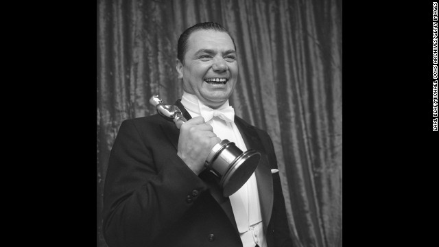 Ernest Borgnine faced heavy competition for best actor, beating out James Dean ("East of Eden"), Frank Sinatra ("The Man With the Golden Arm"), James Cagney ("Love Me or Leave Me") and Spencer Tracy ("Bad Day at Black Rock"). Backstage at the 1956 ceremony, Borgnine holds the Oscar for his portrayal of a lonely butcher in "Marty."