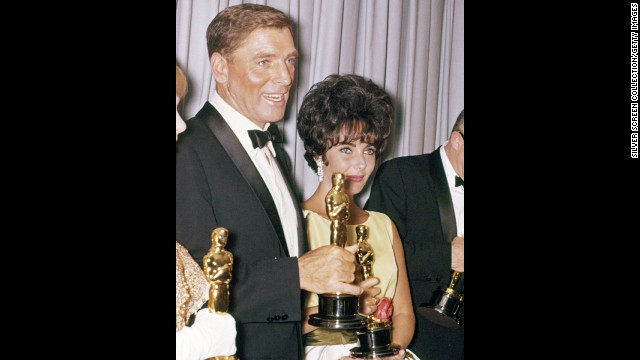 Burt Lancaster was a winner two times over at the 1961 Oscar ceremony. He won the best actor prize for the title role in "Elmer Gantry," and he had glamorous Elizabeth Taylor, best actress winner for "Butterfield 8," by his side backstage.