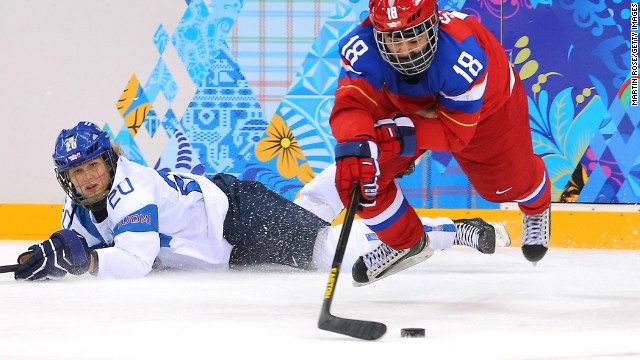 Olga Sosina of Russia handles the puck during a women's hockey game February 18 versus Finland.