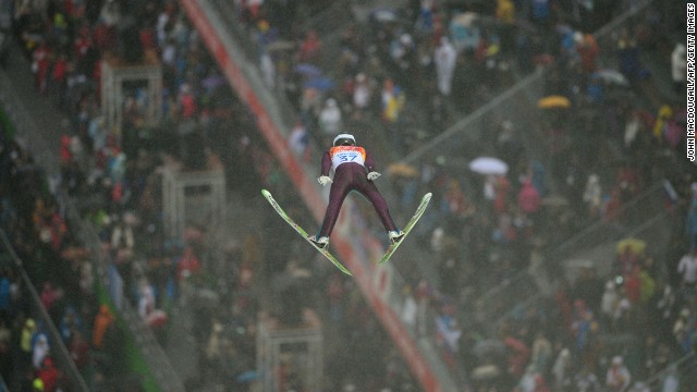 American Bryan Fletcher jumps during the large hill Nordic Combined event on February 18.