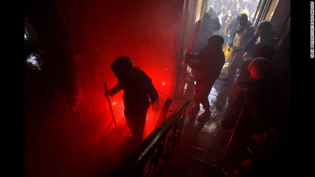 Protesters invade the main office of the ruling Party of Regions in Kiev on February 18.