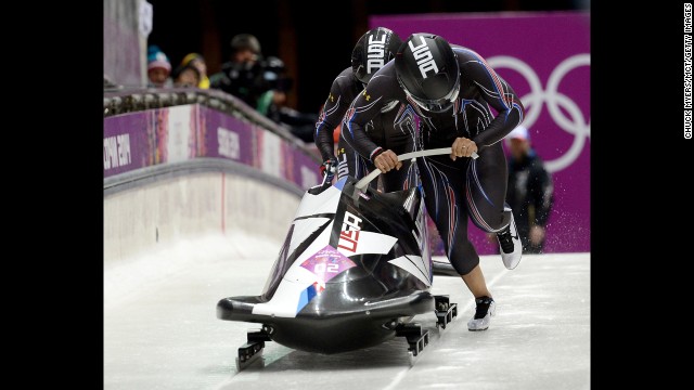Americans Elana Meyers and Lauryn Williams start their first run in the women's bobsled on February 18.