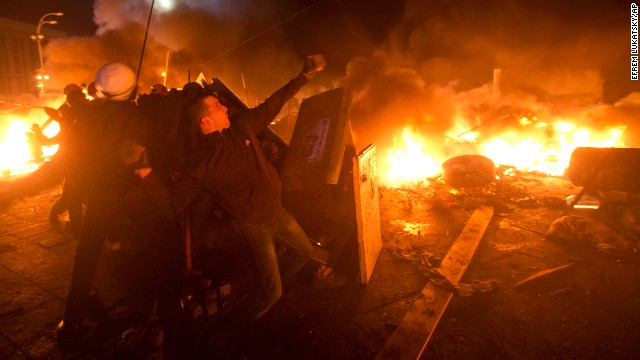 Protesters clash with police in Independence Square on February 18.