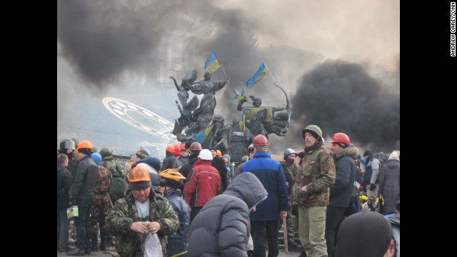 KIEV, UKRAINE: After the deaths of 25 people during clashes a day earlier, Ukrainian protesters prepare to stand and fight again on February 19. Photo taken by CNN's Andrew Carey on February 19. 