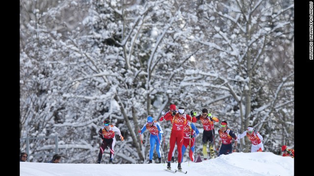 Cross-country skier Dario Cologna of Switzerland leads the pack during the men's team sprint on February 19.
