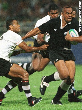 Lomu in action during the 1998 Commonwealth Games against Fiji, where not even the great Waisale Serevi (left) can stop him. New Zealand would go on to take the gold medal, and Lomu is a passionate advocate of sevens: "The greatest thing I love about it is the camaraderie that the players have among all the nations ... that come together to make this beautiful game." 