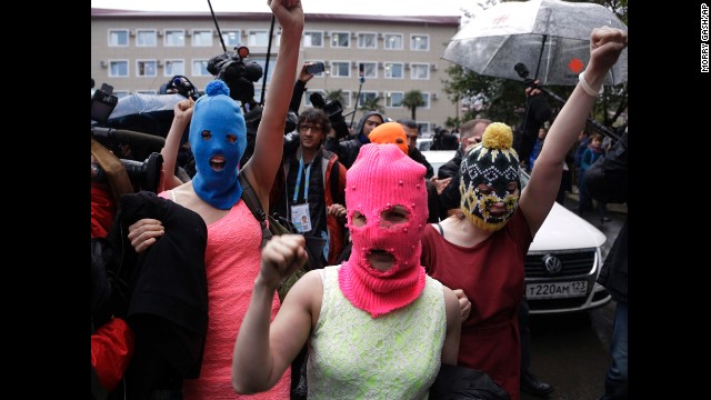 Pussy Riot members make their way through a crowd after they were released on February 18.