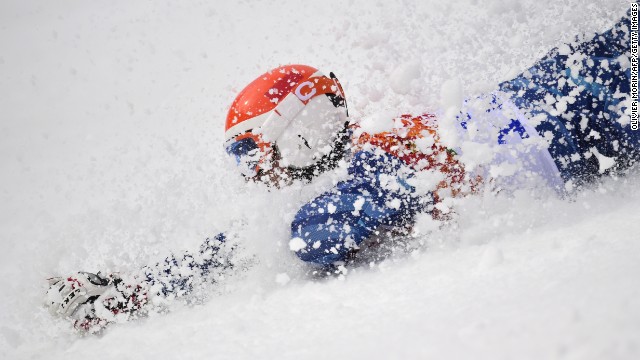 Venezuelan skier Jose Antonio Pardo Andretta crashes during his first run in the giant slalom Wednesday, February 19.