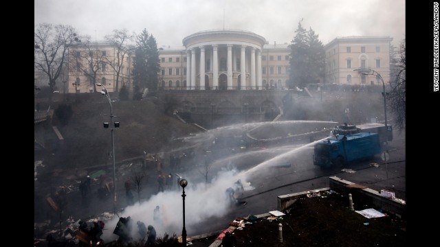 Police use water cannons against protesters in Kiev on February 20.