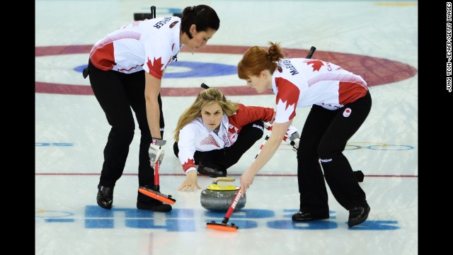 Canada's Jennifer Jones throws the curling stone during the gold-medal match against Sweden on February 20.
