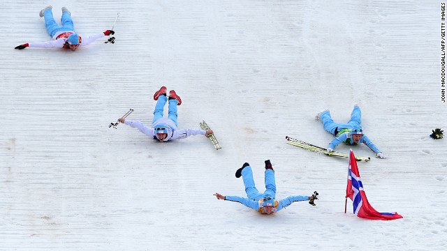 The members of Norway's Nordic combined team -- Magnus Hovdal Moan, Magnus Krog, Haavard Klemetsen and Joergen Graabak -- celebrate after winning the gold medal February 20.